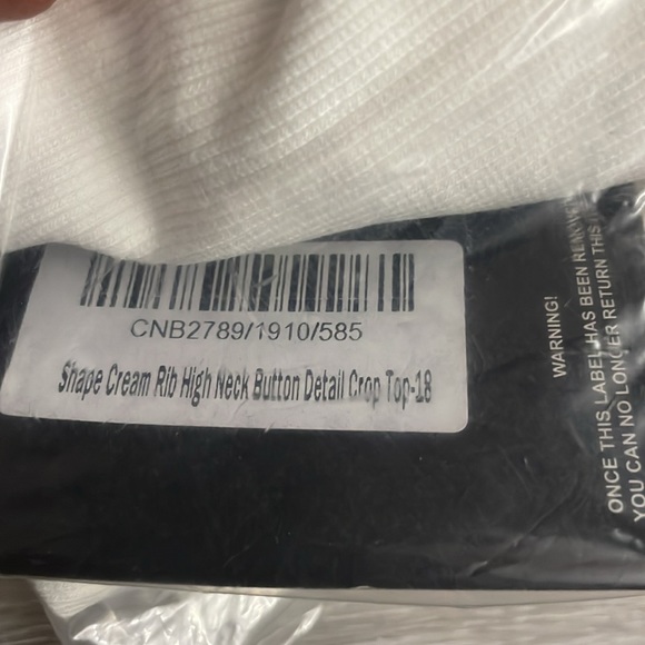 PRETTY LITTLE THING | (18) SHAPE CREAM RIB HIGH NECK BUTTON DETAIL CROP TOP - Picture 9 of 9